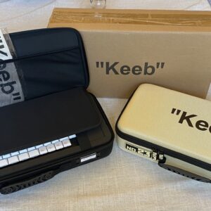 Keyboard cases with "No.23 Keeb" branding.
